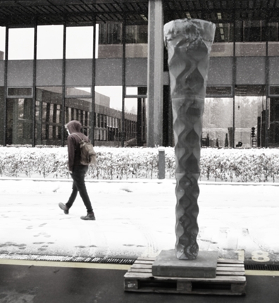 A tapering concrete column with a height of 2.5 -meters